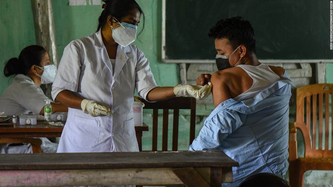 A young man receives a Covid-19 vaccine in Guwahati, India, on Saturday, May 8.