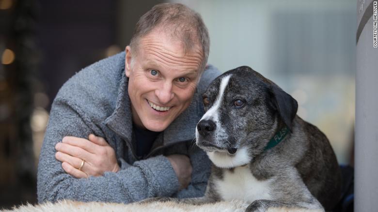 Leadership coach John Bates has a rare condition called Stevens-Johnson syndrome. Thanks to his service dog, Flash, he is able to travel internationally for speaking engagements.