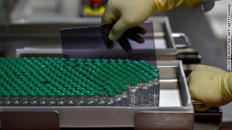Vials of Covishield, AstraZeneca-Oxford&#39;s Covid-19 coronavirus vaccine are pictured inside a lab where they are being manufactured at India&#39;s Serum Institute in Pune on January 22, 2021.