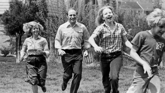 From left, Lynne, Dick, Liz and Mary Cheney run in the yard of their family home in McLean, Virginia, in 1980.