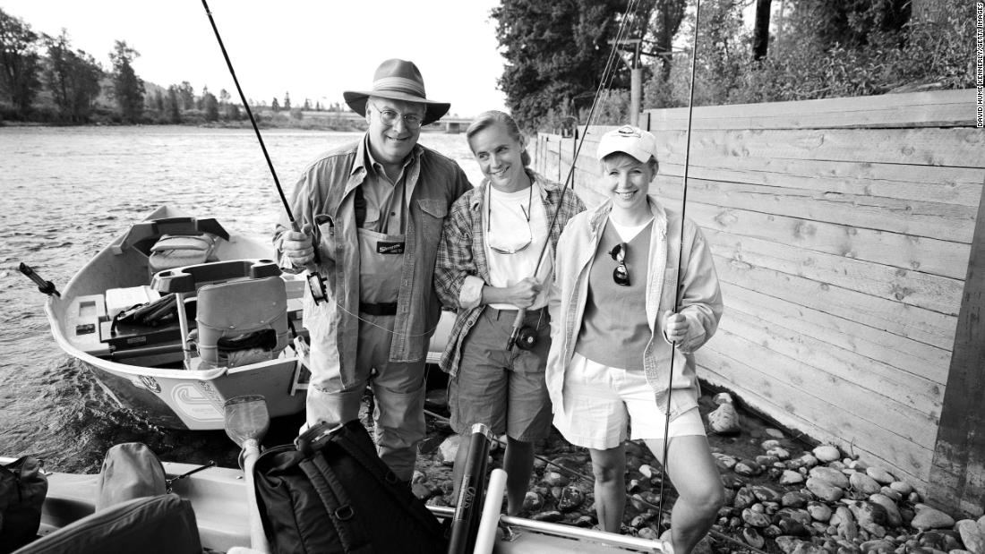 Dick Cheney fishes with Mary, center, and Liz in August 2000.