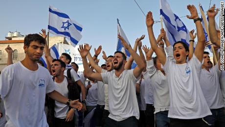 Israelis take part in a Jerusalem Day march on May 10. This was diverted at the last minute by police.