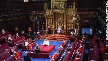 Speech was more muted than usual, with a measure of social distancing that meant the House of Lords was far from full.