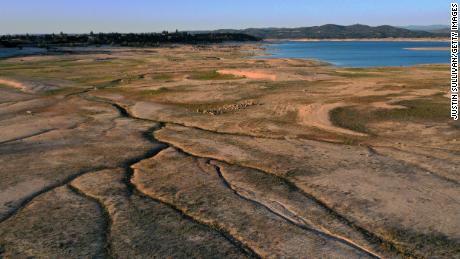 In an aerial view, low water levels are visible at Folsom Lake on May 10, 2021 in Granite Bay, California.