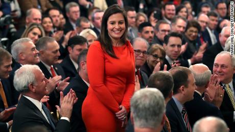 Stefanik stands as she&#39;s acknowledged by U.S. President Donald Trump as he speaks one day after the U.S. Senate acquitted on two articles of impeachment, in the East Room of the White House February 6, 2020 in Washington, DC. 