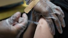 A teenager is inoculated with Pfizer&#39;s vaccine against coronavirus disease (COVID-19) after Georgia authorized the vaccine for ages over 12 years, at Dekalb Pediatric Center in Decatur, Georgia, U.S. May 11, 2021.   REUTERS/Chris Aluka Berry