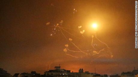 Israel's Iron Dome anti-missile system fires interceptor missiles.