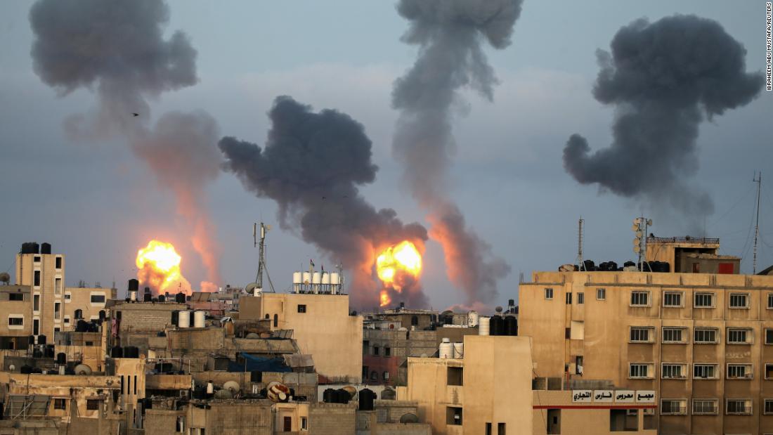 Flames and smoke rise from buildings in southern Gaza during Israeli airstrikes on May 11.