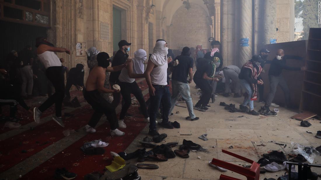 Palestinians are seen at the Aqsa Mosque compound during confrontations with Israeli police on May 10. 