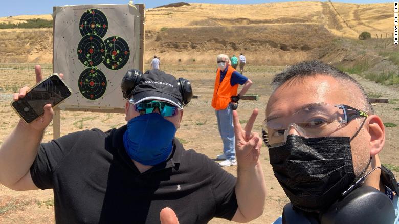 AAPI GO co-founder Scott Kane (left) and member Philip Pang (right) pose for a picture at the Livermore Pleasanton Rod &amp; Gun Club in Livermore, California, in this undated photo.