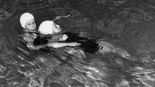 The then-Princess Elizabeth wins a life-saving award at the Children's Challenge Shield Competition, held at the Royal Bath Club in London on June 28, 1939. 