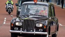 The Imperial State Crown is driven back to Buckingham Palace after the event.