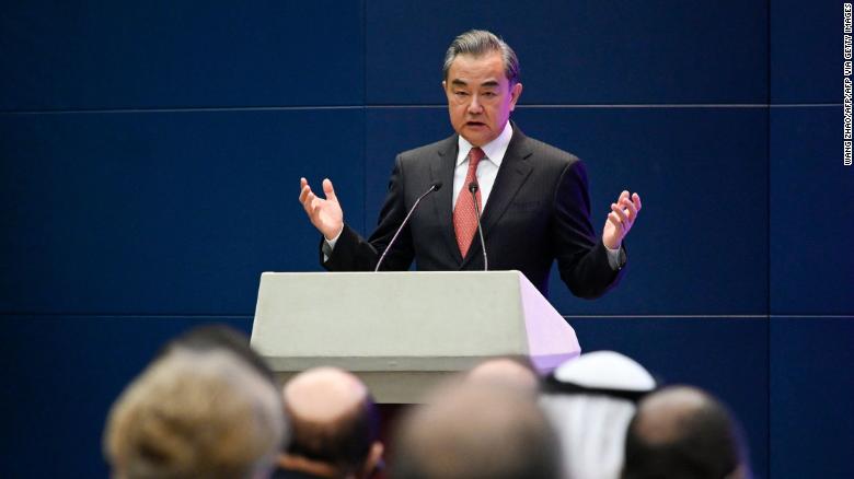 China&#39;s Foreign Minister Wang Yi speaks at a promotional event in Beijing on April 12, 2021.
