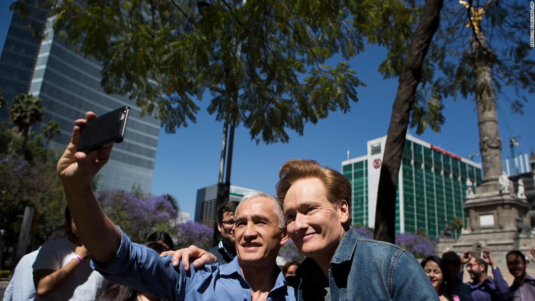 O&#39;Brien poses for a photo with journalist Jorge Ramos as they walk in Mexico City in 2017. O&#39;Brien taped an episode of his show in Mexico to &quot;do something positive&quot; after the tensing of US-Mexico relations.