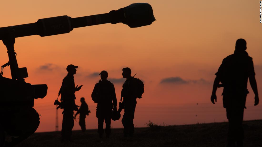Israeli soldiers prepare an artillery unit in Sderot, Israel, near the border with Gaza on May 14.