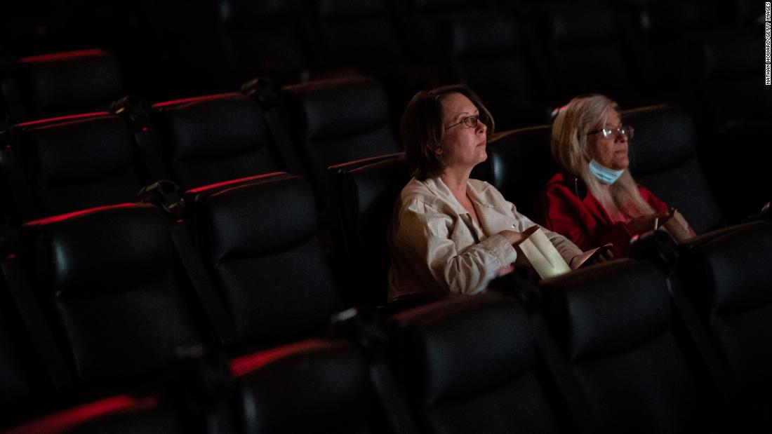 Two moviegoers watch a film at the Kiggins Theatre in Vancouver, Washington, on May 14. Many places in the United States &lt;a href=&quot;https://www.cnn.com/2021/04/30/health/us-coronavirus-friday/index.html&quot; target=&quot;_blank&quot;&gt;are starting to reopen and get back to some sort of normal&lt;/a&gt; as more people get vaccinated.