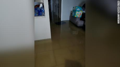 Water covers the floor of  Lamar Pitre&#39;s home in Lake Charles