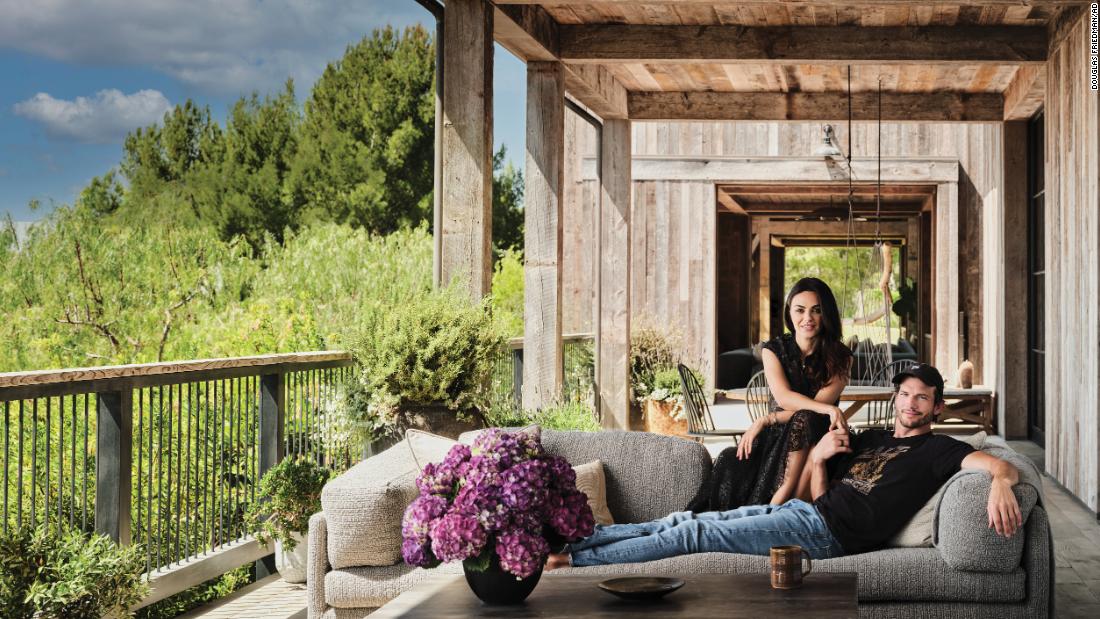 Mila Kunis and Ashton Kutcher open the doors to their stunning barn-inspired home