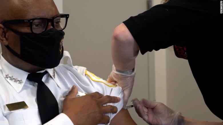 Police departments cope with officers' vaccine hesitancy