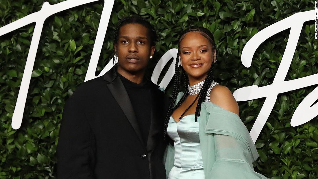 A$AP Rocky and Rihanna pose on the red carpet upon arrival at The Fashion Awards 2019 in London on December 2, 2019. 