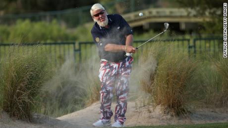 Daly plays his shot on the first hole out of the sand during the first round of the 2021 PGA Championship.