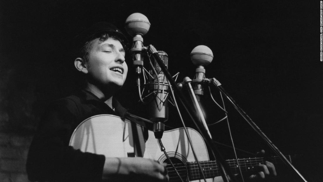 Dylan performs at The Bitter End folk club in New York City in 1961. His first album, &quot;Bob Dylan,&quot; came out in 1962 and consisted mostly of old folk songs.