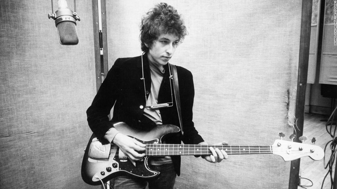 Dylan records his album &quot;Bringing It All Back Home&quot; in 1965. The album was a mix of acoustic and electric guitar. Dylan&#39;s move to electric was controversial at the time. Some fans wanted him to stick with the acoustic music they were used to hearing from him.