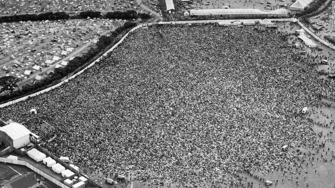 Nearly 200,000 fans wait for Dylan to perform at the Isle of Wight Festival in 1969. The stage is on the bottom left.