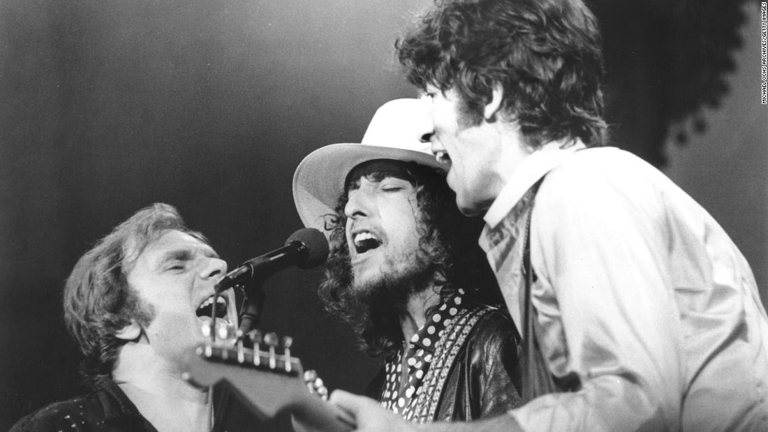 Dylan, center, performs with Van Morrison, left, and Robbie Robertson of The Band at a concert in San Francisco in 1976.