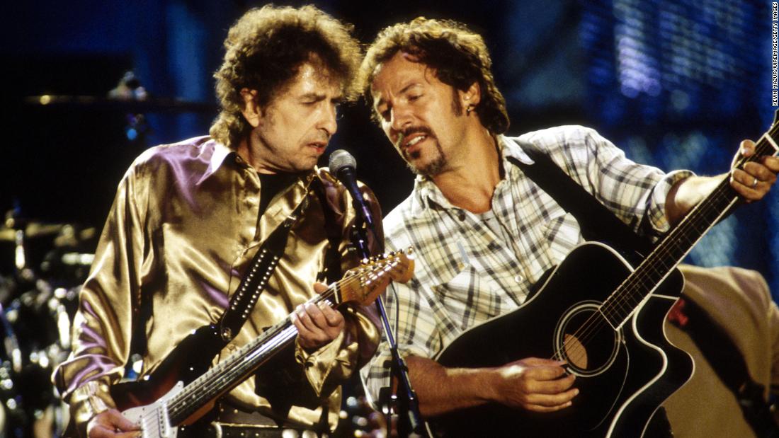 Dylan and Bruce Springsteen perform &quot;Forever Young&quot; at a concert for the Rock &amp;amp; Roll Hall of Fame in 1995.