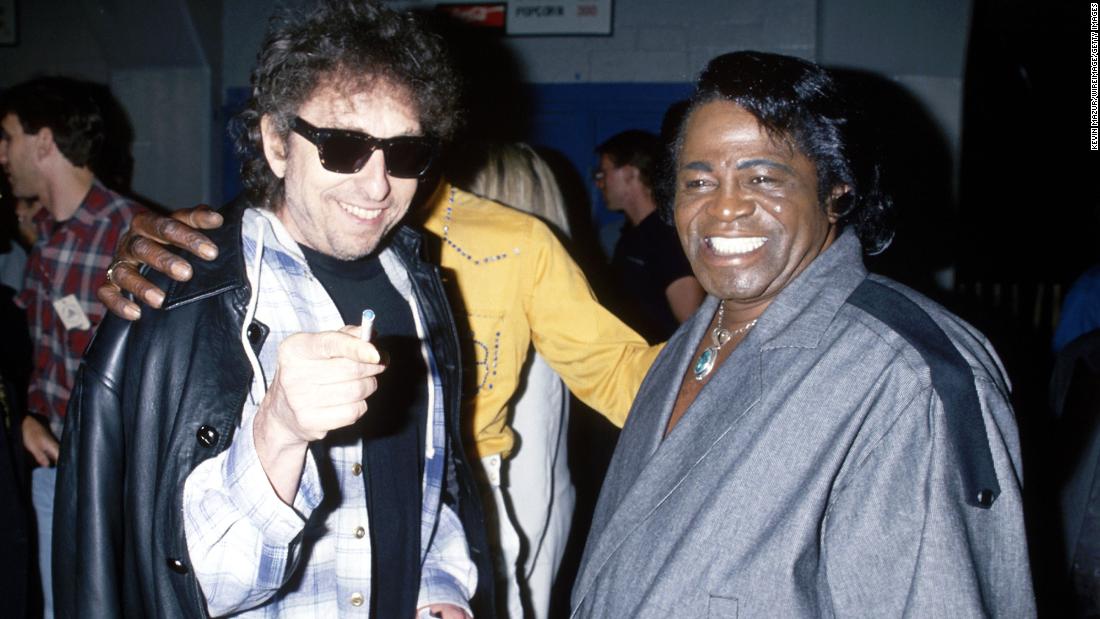 Dylan talks with James Brown, &quot;The Godfather of Soul,&quot; in 1990.