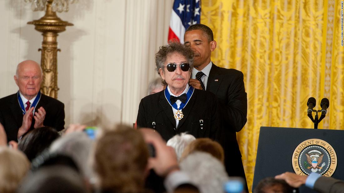 Dylan receives the Presidential Medal of Freedom from President Barack Obama in 2012. &quot;I remember, you know, in college, listening to Bob Dylan and my world opening up, &#39;cause he captured something about this country that was so vital,&quot; Obama said.