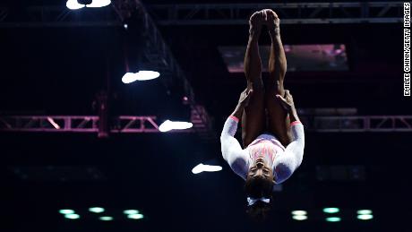 Simone Biles becomes first woman to land Yurchenko double pike in return to competition