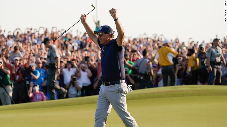 Mickelson celebrates after winning the PGA Championship.