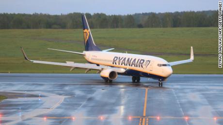 The Ryanair flight was allowed to resume its journey to Vilnius after two dissidents were removed from the plane.