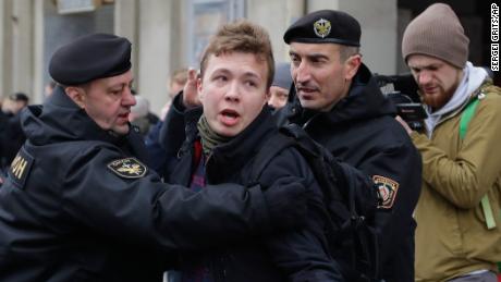 Belarus police detain journalist Roman Protasevich in Minsk, Belarus, Sunday, March 26, 2017. Dozens protestors were detained during attempt to rally in downtown Minsk. ﻿﻿(AP Photo/Sergei Grits)