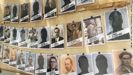 Photographs of the victims are on display at the cemetery in Almagro.