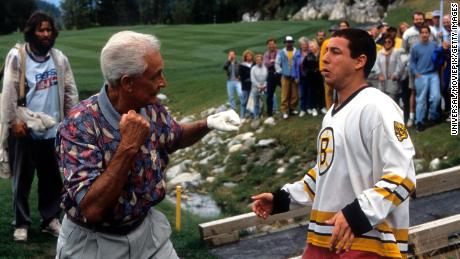 Bob Barker prepares to punch Adam Sandler in a scene from the film &#39;Happy Gilmore,&#39; 1996. 