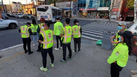 About 25 people volunteer with the Public Safety Patrol to deter crime in Flushing, New York.