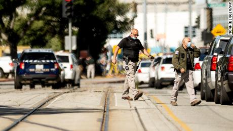 Law enforcement officers respond to the scene of a shooting at a Santa Clara Valley Transportation Authority (VTA) facility on Wednesday, May 26, 2021, in San Jose, California.