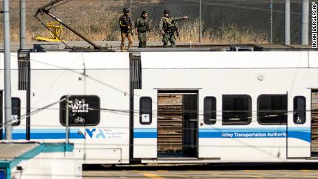 Law enforcement officers respond to the scene of a shooting at a Santa Clara Valley Transportation Authority (VTA) facility on Wednesday.