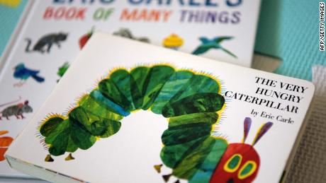 This photo illustration taken on May 26, 2021, shows Eric Carle&#39;s &quot;The Very Hungry Caterpillar&quot; and &quot;Book of Many Things&quot; in Los Angeles, California.