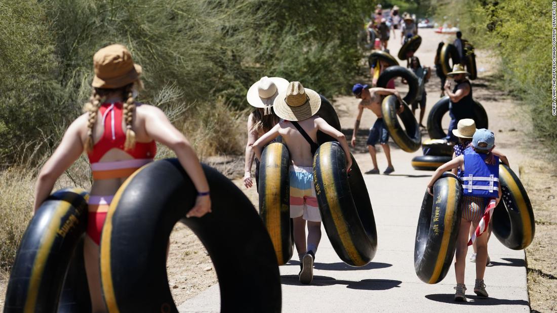 Tubers make their way to the lower Salt River in Arizona on Saturday.