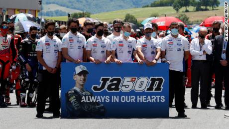 Jason Dupasquier’s teammates keep a minute of silence in his memory on Sunday.
