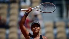 Osaka celebrates after beating Tig during their women's singles first round match in the French Open.