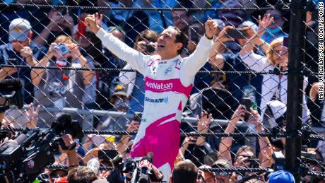 Helio Castroneves celebrates after winning the 105th Indy 500.