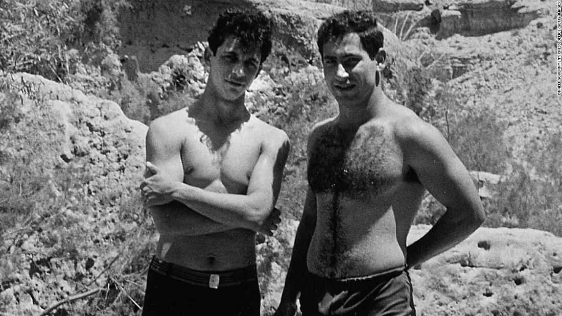 Netanyahu, right, poses with a friend in the Judean Desert in 1968.