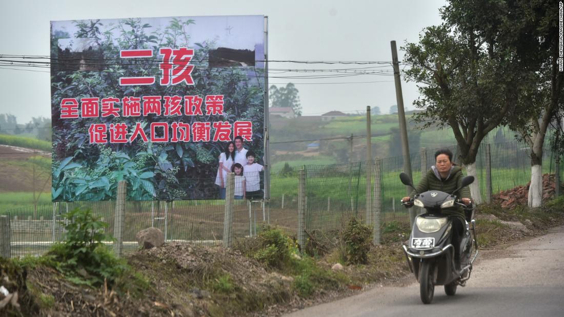 A signboard promoting China's two-child policy in Neijiang, China, on March 23, 2017.