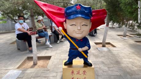A cartoon character in Yan&#39;an, a &quot;red site&quot; in northern Shaanxi province, which advertises a stage extravaganza on the Communist Party&#39;s early days.