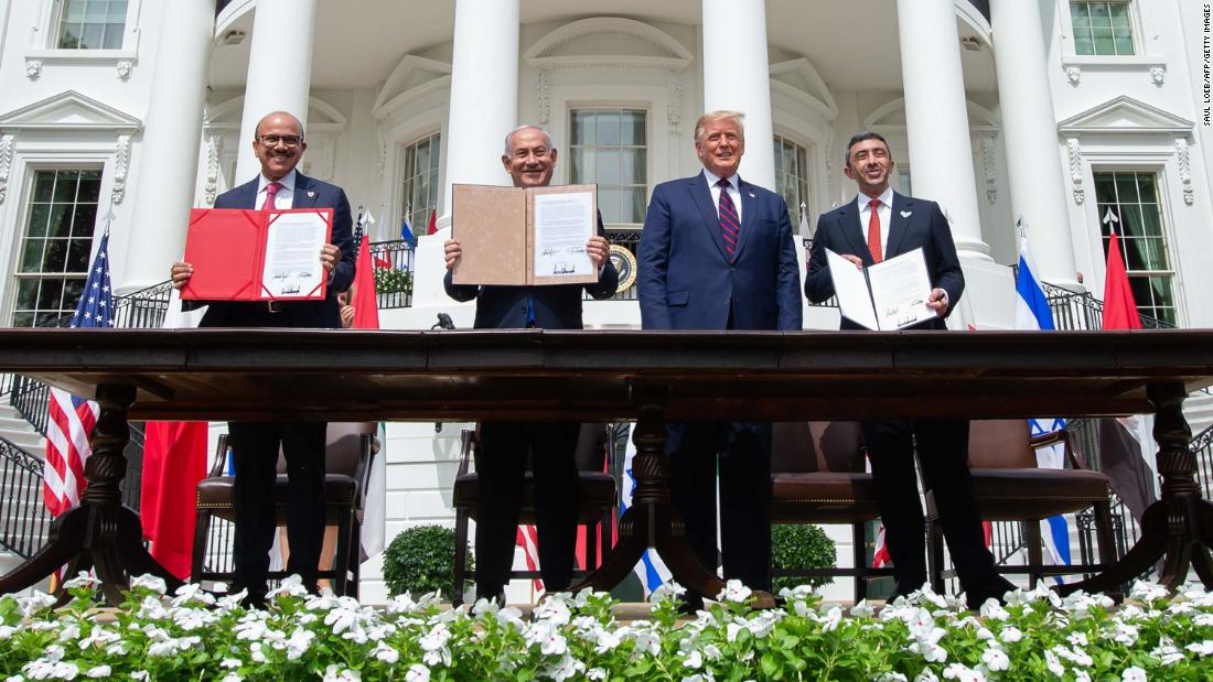 From left, Bahrain Foreign Minister Abdullatif al-Zayani, Netanyahu, US President Donald Trump and United Arab Emirates Foreign Minister Abdullah bin Zayed Al-Nahyan hold up documents at the White House after participating in the signing of the Abraham Accords in September 2020. The agreement normalized relations between Israel and the two Gulf nations.